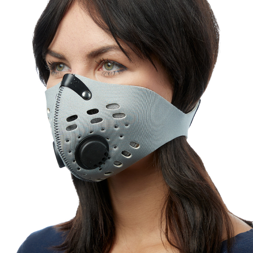 Angled view of woman wearing silver RZ M1 Neoprene face mask