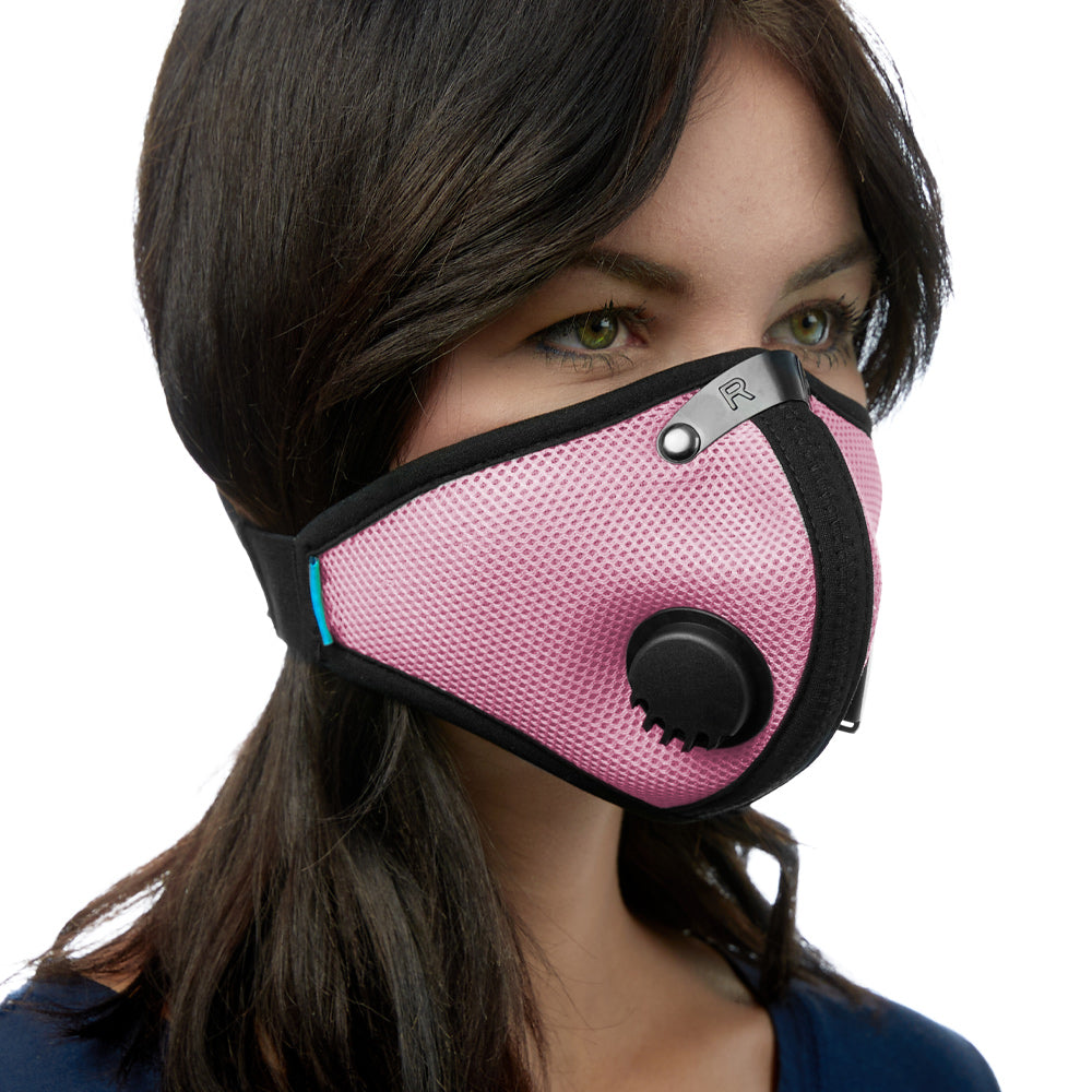 Angled view of woman wearing pink RZ M2 Mesh face mask