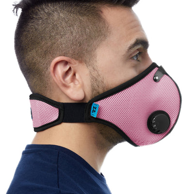Side view of man wearing pink RZ M2 Mesh face mask