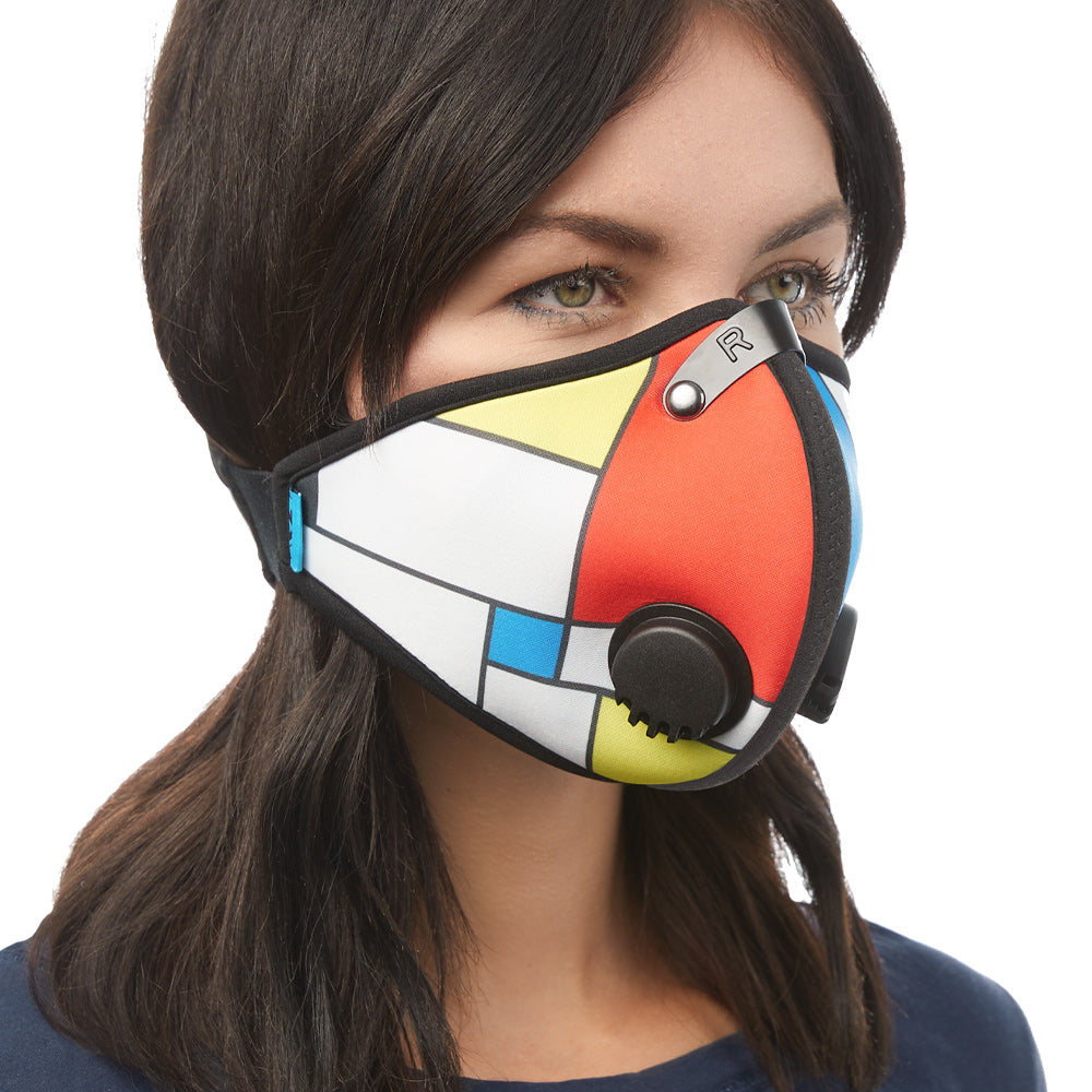 Angled view of woman wearing RZ M2 Nylon Mondrian mask shell
